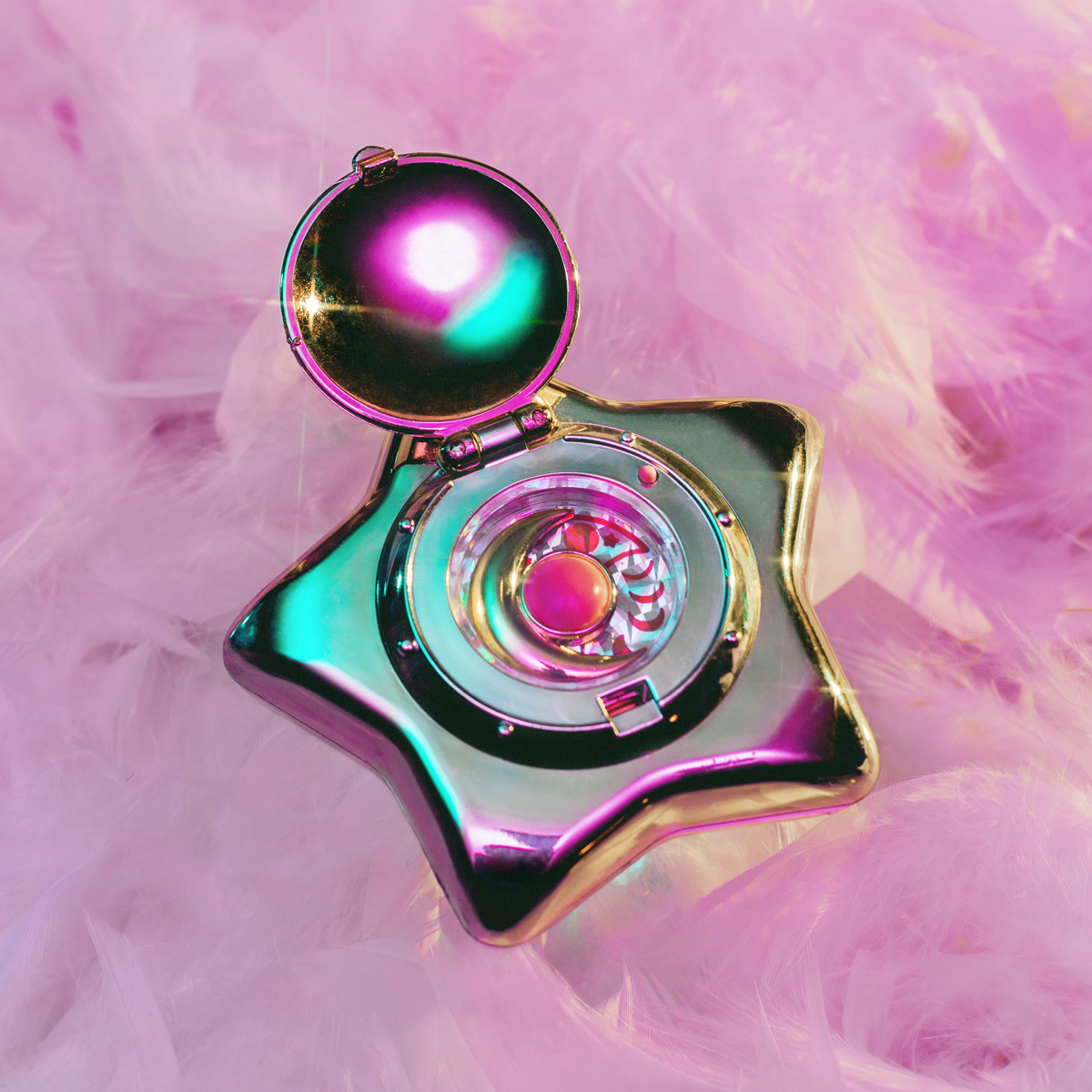 Silver star against a pink background